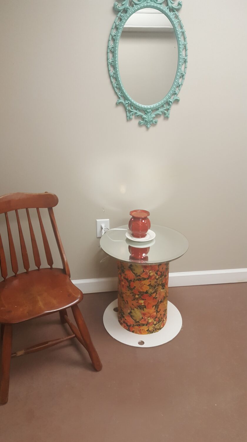 Empty Wood Spool Upcycled Into A Seasonally Decorated Side Table