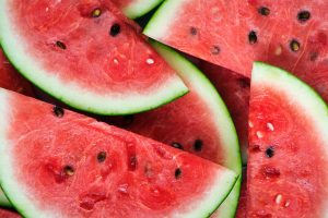 close up photography of sliced watermelons
