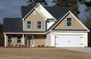 brown and white wooden house low-maintenance