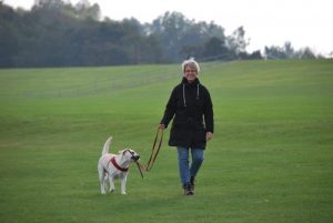 lady walking her furry friend