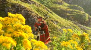 bagpipe player in the highlands