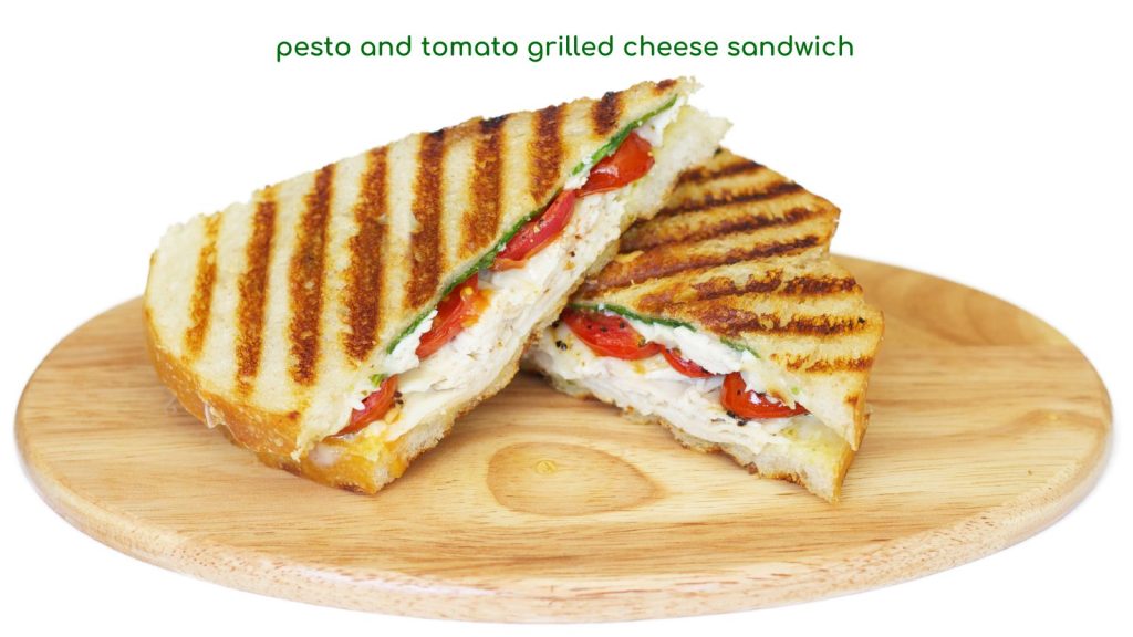 pesto and tomato grilled cheese sandwich